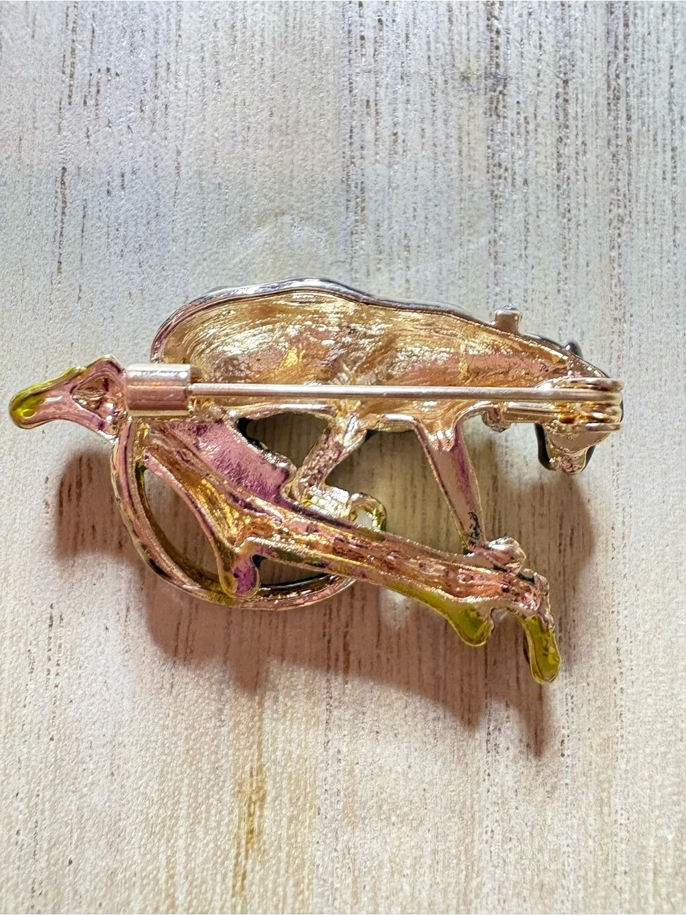 Gold-Tone Leopard Brooch with Green Accent on Branch